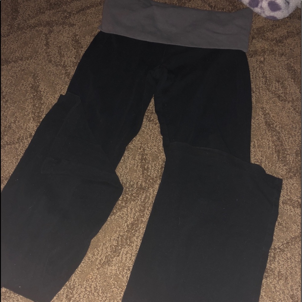 Pink foldover yoga pants with pink logo on back